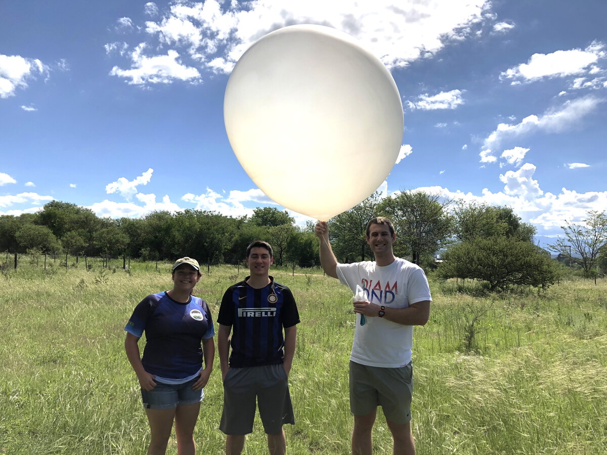 CliMAS students launching a weather balloon during the RELAMPAGO field campaign in Argentina