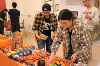 Students setting up party snacks