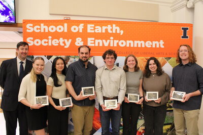 Students posing with awards.