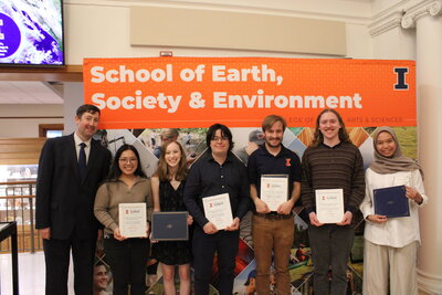 Students posing with awards.